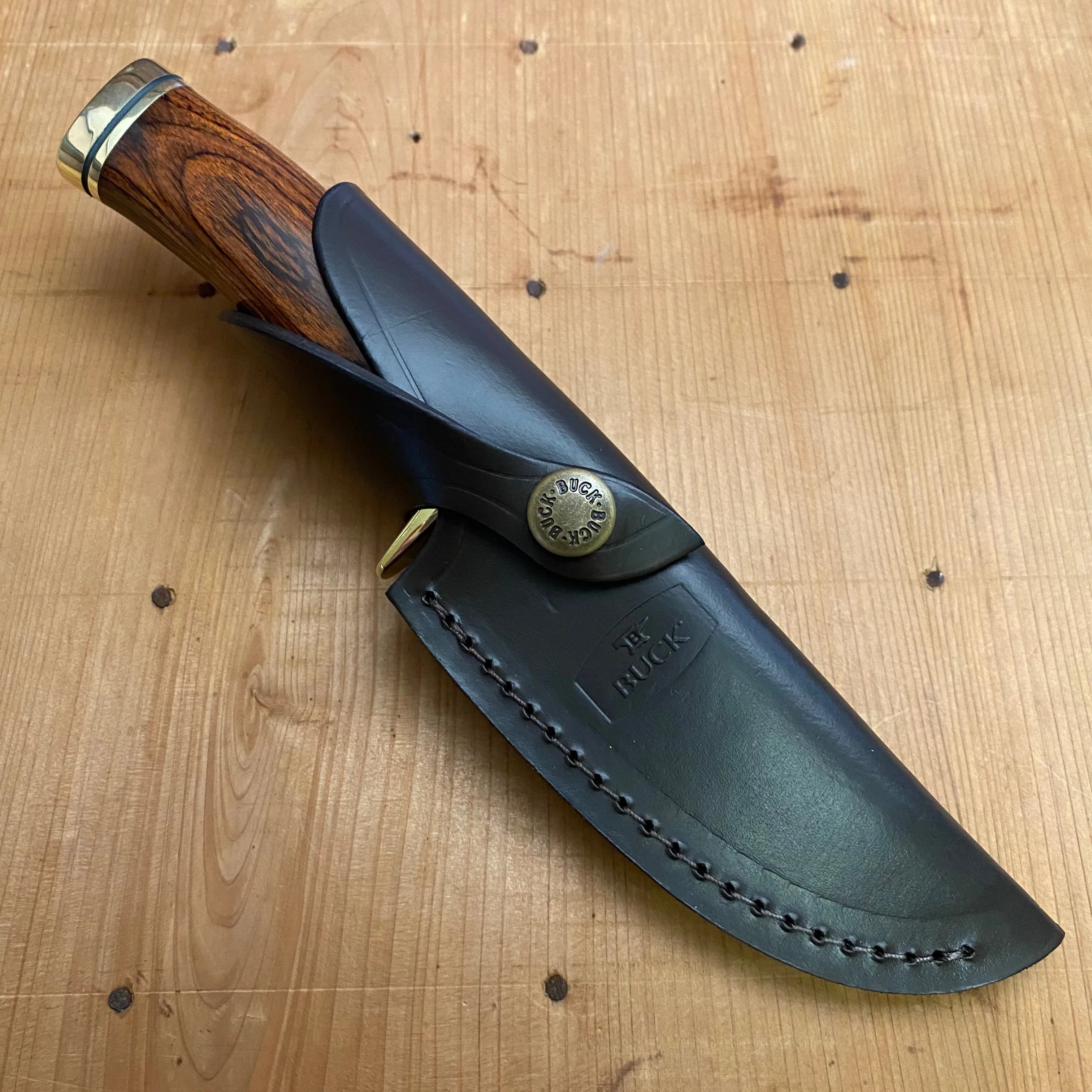 Buck 191 Zipper 4 1/8" Drop Point 420HC Fixed Blade Wood Handle with Guthook and Leather Sheath
